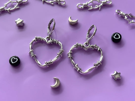 HEARTBREAK - Silver Barbed Heart Earrings